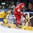 MINSK, BELARUS - MAY 22: Sweden's Joel Lundqvist #20 and Roman Graborenko #92 of Belarus battle for the puck along the boards during quarterfinal round action at the 2014 IIHF Ice Hockey World Championship. (Photo by Andre Ringuette/HHOF-IIHF Images)